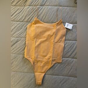 Free People pastry shell colored Bodysuit xs/sm